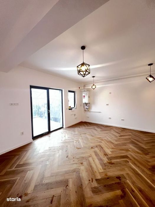 Apartament 2 camere+curte 60mp si 2 locuri de parcare/Bragadiru — fotografia 3