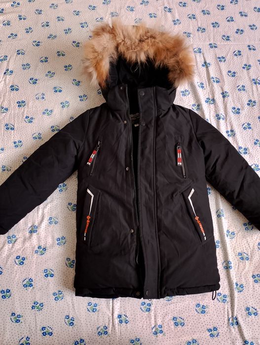 Продам зимнию куртку детскую
