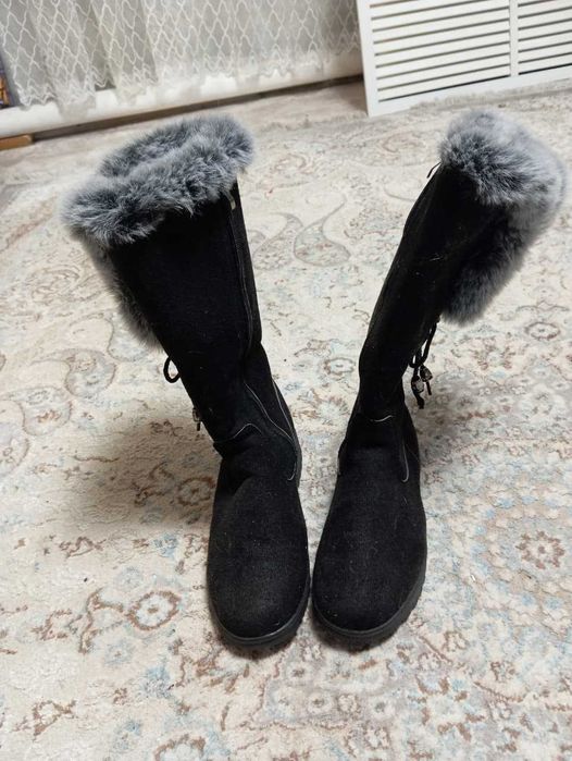 Продам сапоги новые