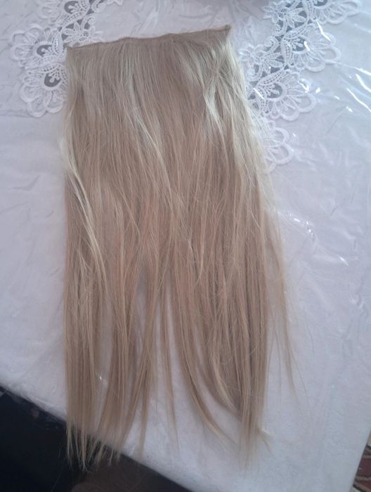 Tresa par Nicole  D Mar imita bine parul natural