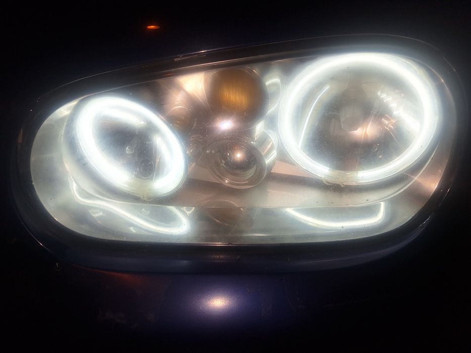 Оригинални фарове с лупи за голф.Имам и без лупи  с ангелски очи...