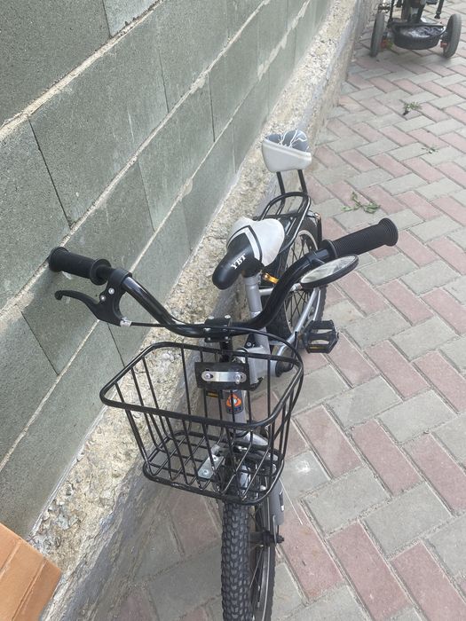 Продам автокресло и велосипед
