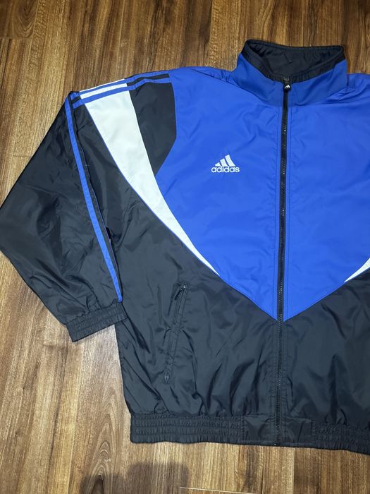 ADIDAS 90s retro windbreaker for men in blue and black colour.