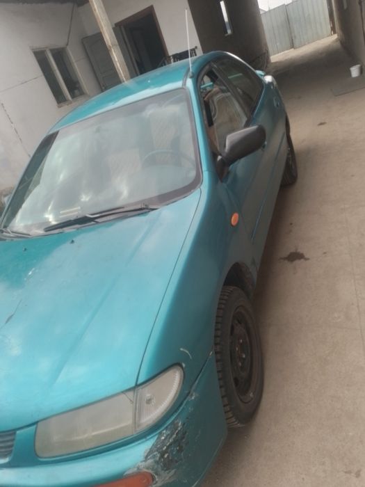 Мазда 323 ВА фамилия