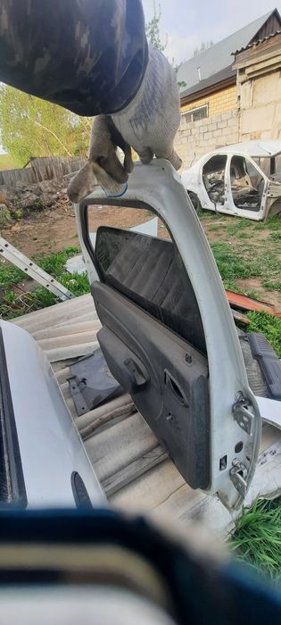 Дверь левая задняя рено логан1