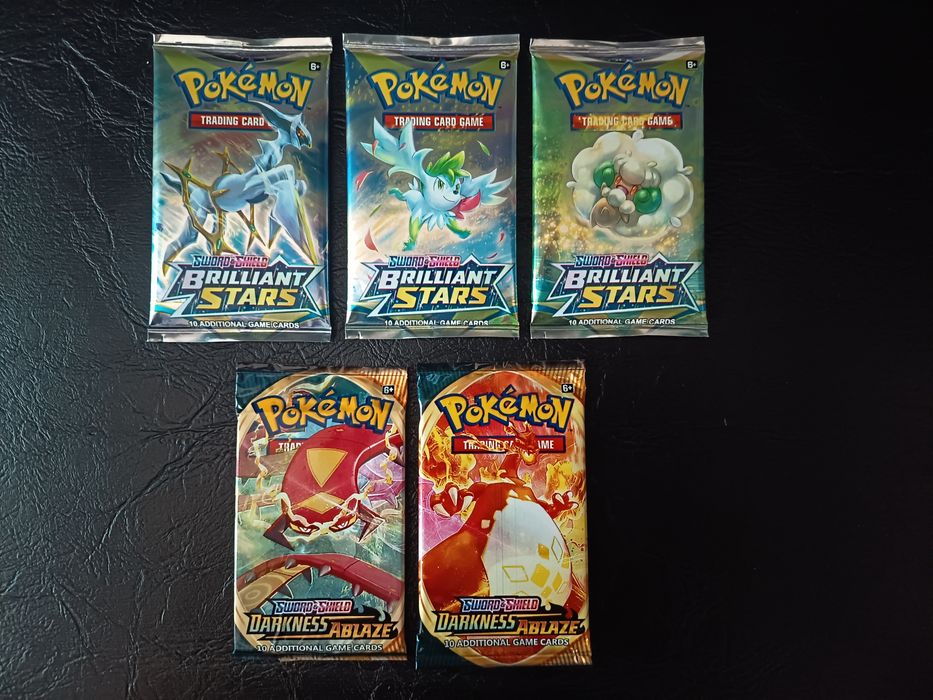 5 Pachete de carti pokemon sigilate.