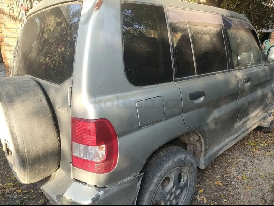 Машина Mitsubishi Pajero io