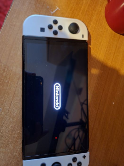 Nintendo Switch OLED in stare perfecta