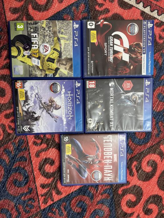 PlayStation диски и подставка