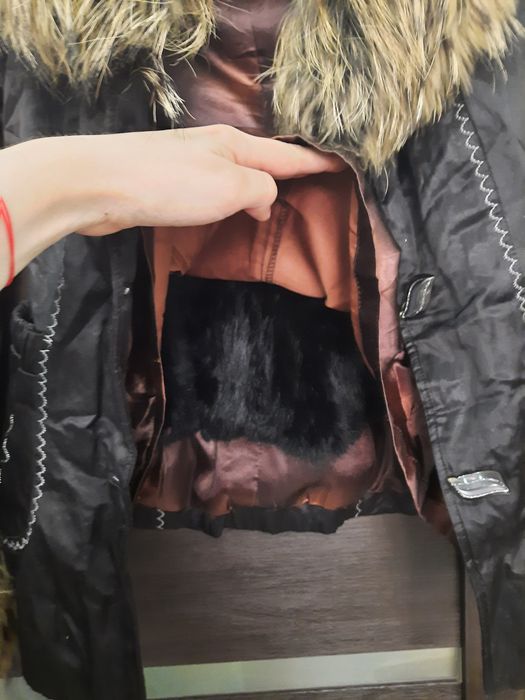 Продам куртку с мехом.