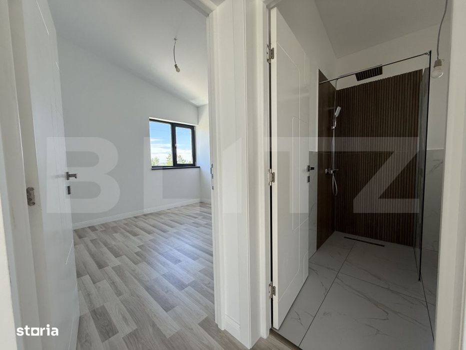 Casa pe parter cu un design deosebit, zona nordica / Simnicul de Jos