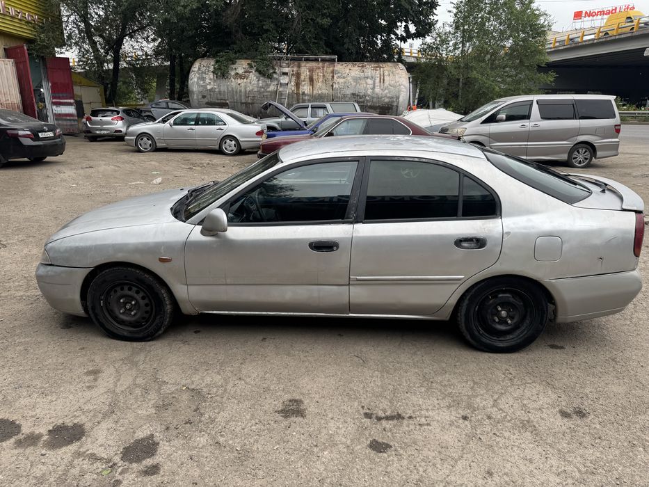 Mitsubishi Carisma 1997 Митсубиси