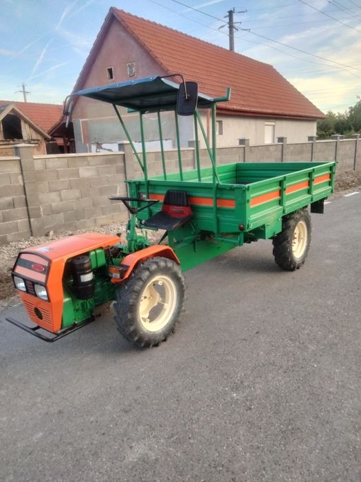 Vand motoagricola 18 ca și tractor 445 plus utilaje aferente pentru tractor freza de 170 plug cu doua câmpuri tocătoare de resturi vegetale și remorca