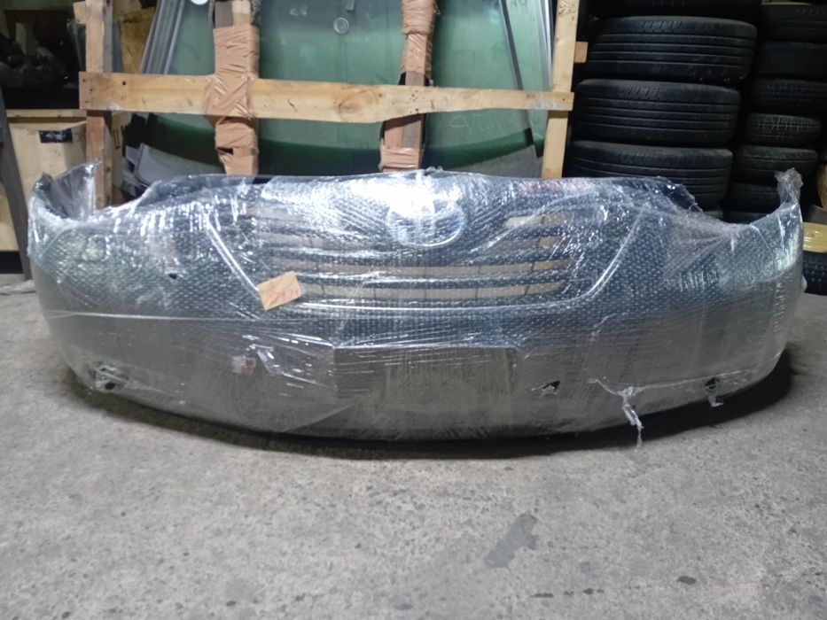 Передний бампер Toyota Camry 40