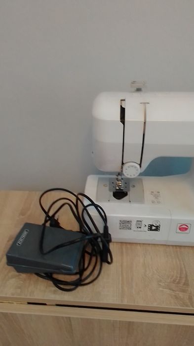 Швейная машинка,требует  регулировки
