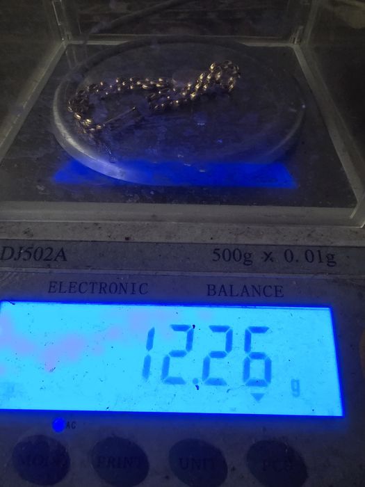 Золотые женские часы..