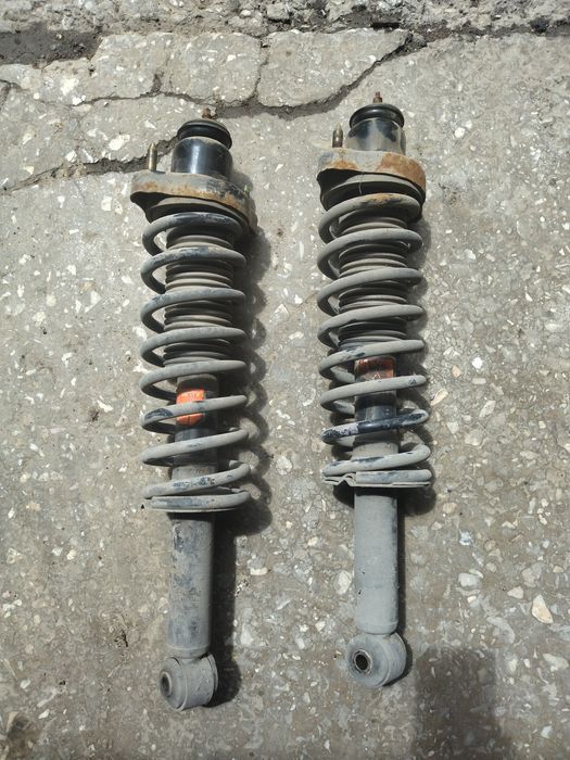 Пружины оутландер 1 поколение с амортизаторами