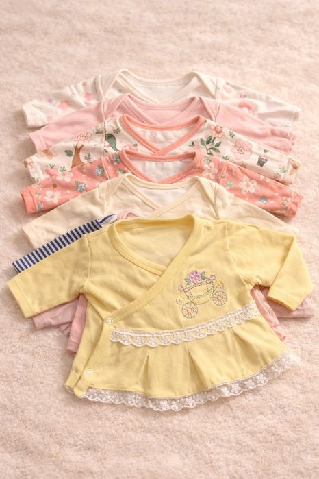 Очень много одежды для новорожденной