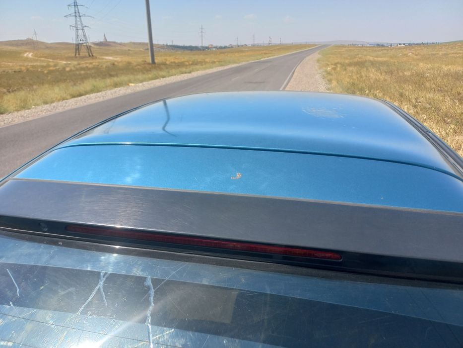 Мазда323F 95г бензин