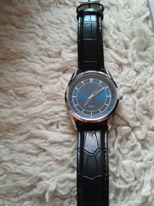 М.часовник кварцов