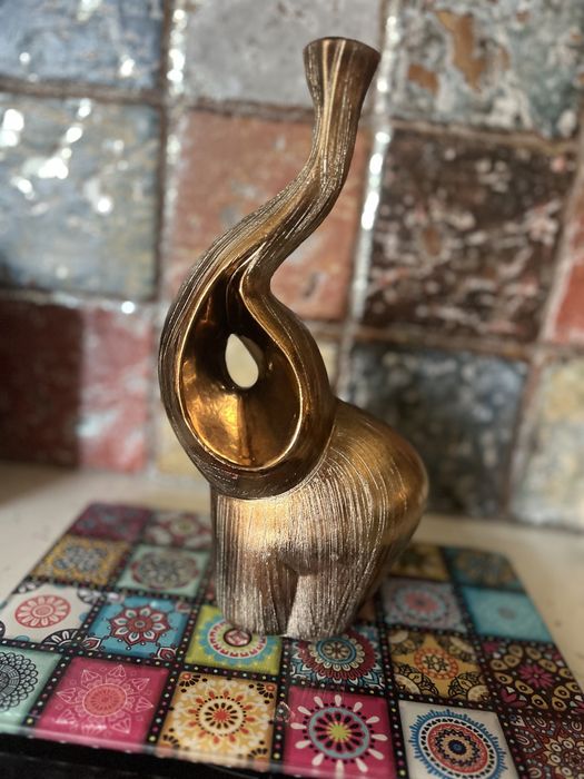 Свeщник нов слон