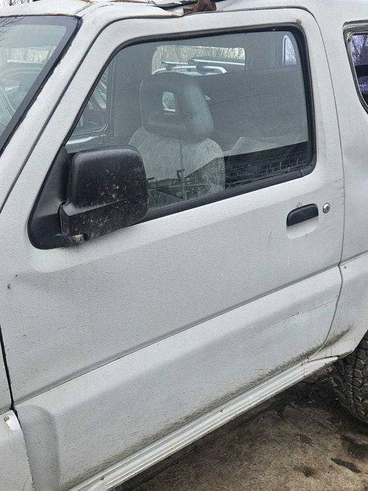 Usa dezechipata stanga/dreapta fata Suzuki Jimny 2003