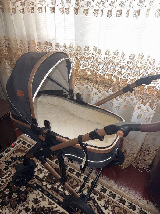 Детская коляска с автолюлькой