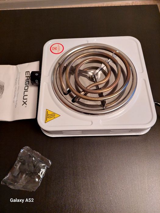 Продам электрическую  плитку в упаковке!