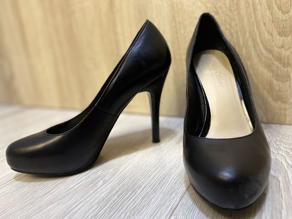 Черные туфли с красной подошвой