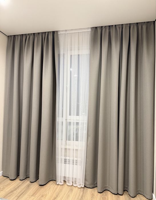 Продам шторы серого цвета новые
