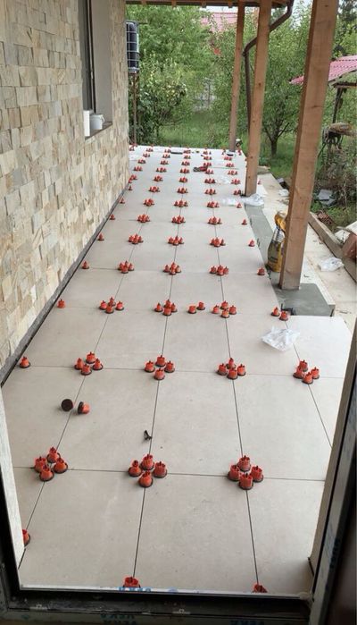 Montez gresie , faianta,travertin ,trepte hidroizolatii bai -terase.