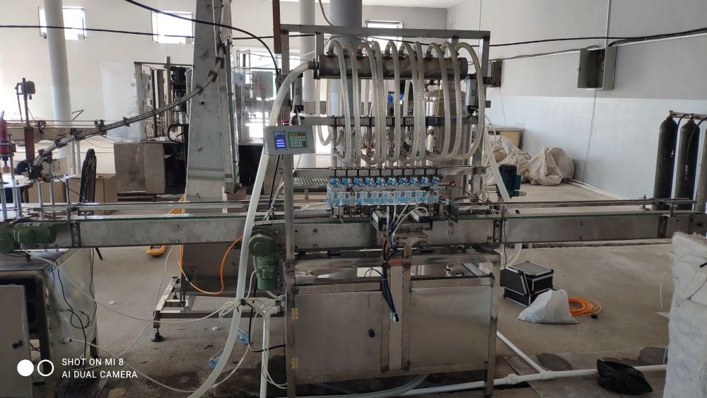 Сув куйиш линияси. дозатор, розлив