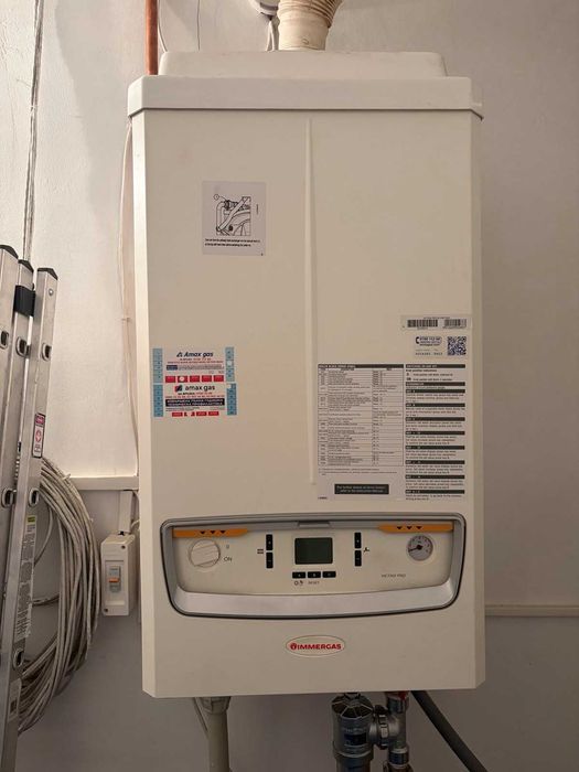 Газов котел Immergas VICTIX PRO 55 kW в пакет с работеща отоплителна система