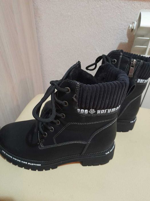 Продам новые зимние ботинки