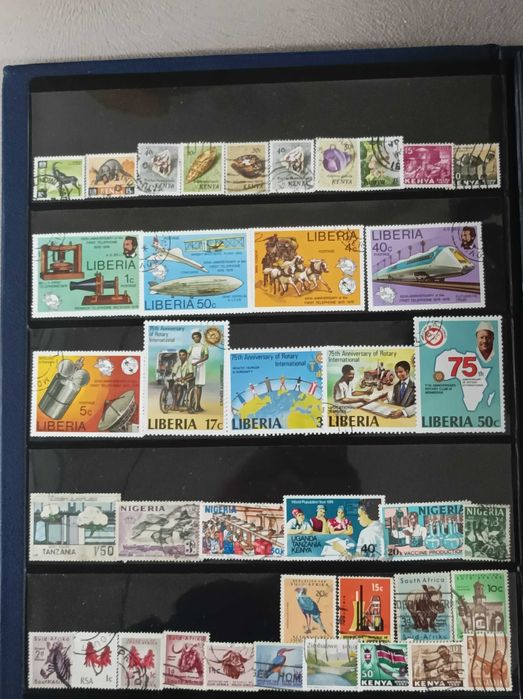 Колекции пощенски марки на теми Воден Транспорт, Транспорт и  Африка
