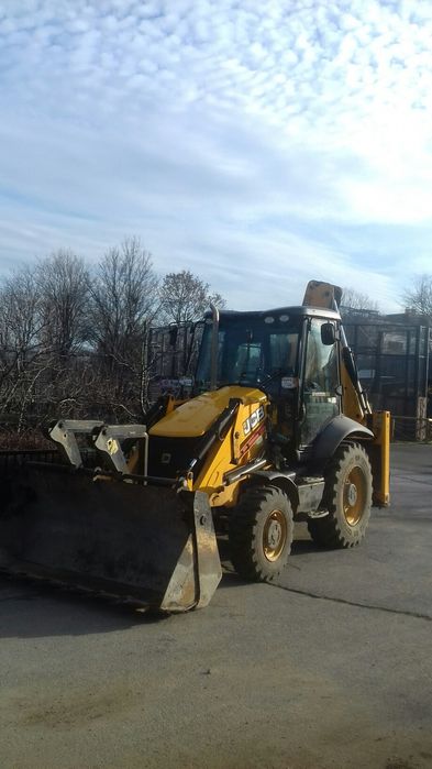 Услуги с комбиниран багер  хидравличен чук и палетни вилици