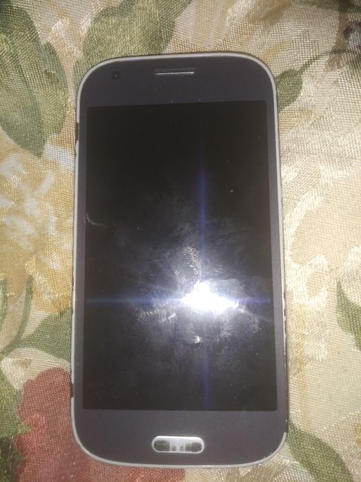 Телефон Самсунг.