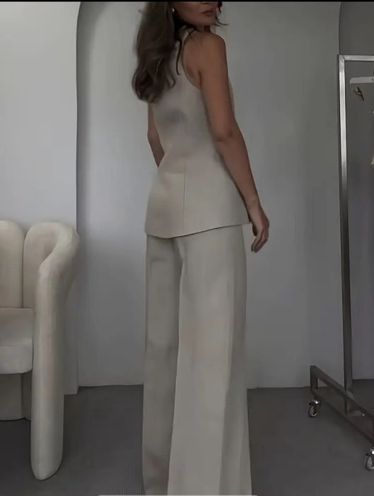 Set vesta și pantaloni