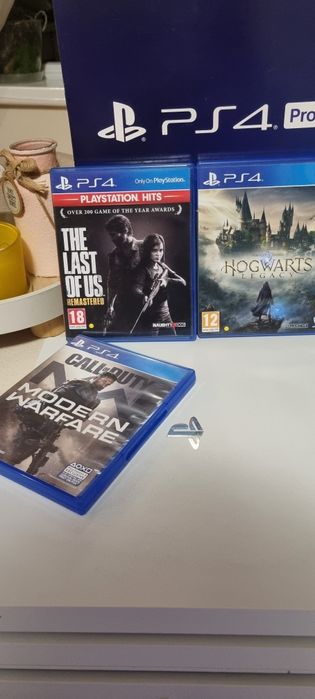 Playstation 4 Pro 1TB + 2 джойстика + Станция за зареждане + 3 игри