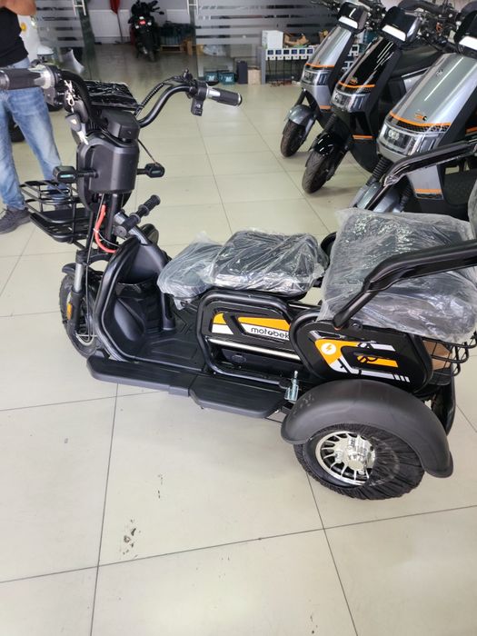 Трех колёсный электроскутер для тех кто любит комфорт