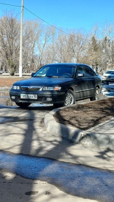 Мазда 626 птичка