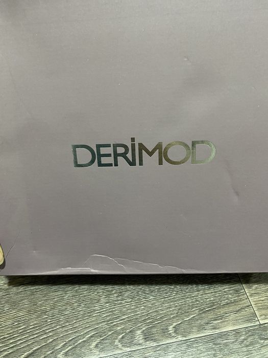 Фирменные ботинки Derimod