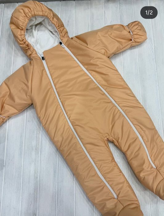 Продам новый комбинезон .