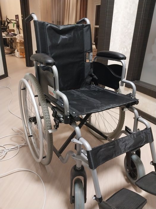 Инвалидная коляска