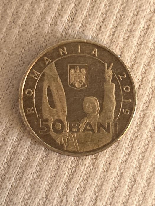 Moneda 50 bani  revoluția 1989