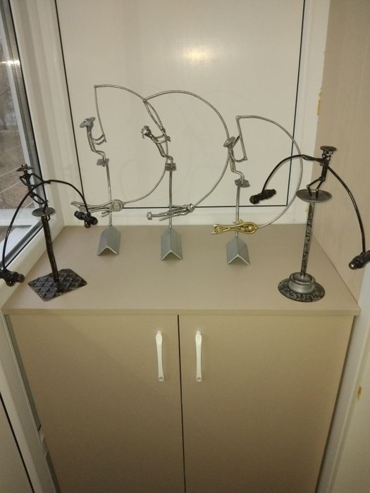 Сувенирчики неваляшки,рыбаки, акробаты.