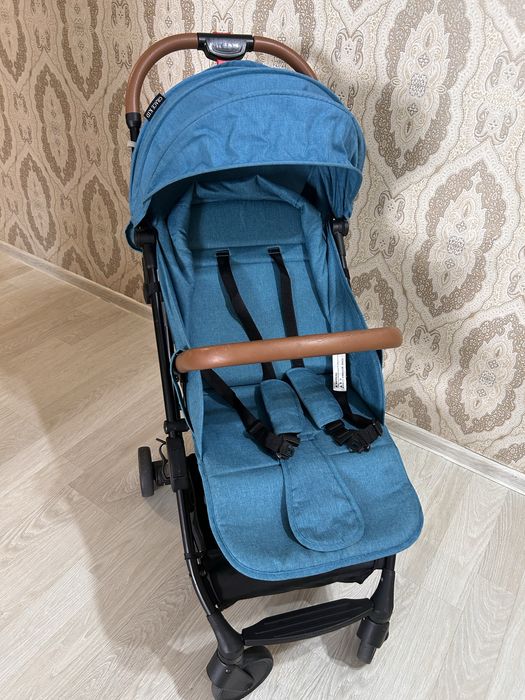Детская прогулочная коляска