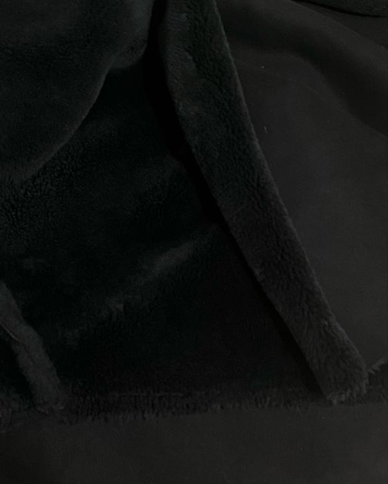 Vesta blana artificiala