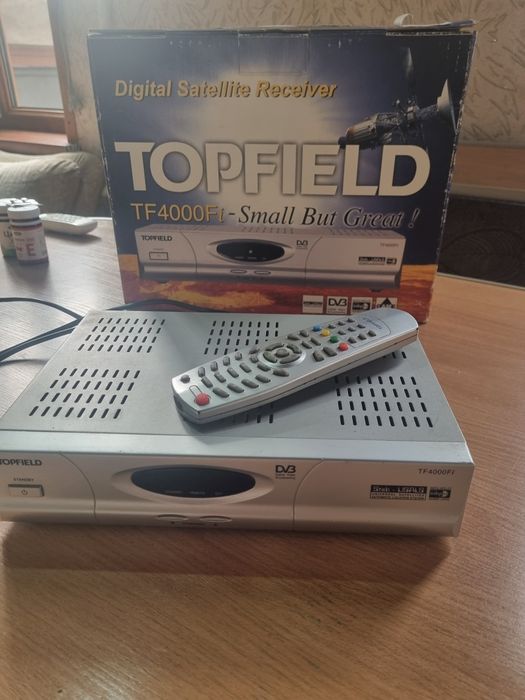 Тюнер Topfield.       .