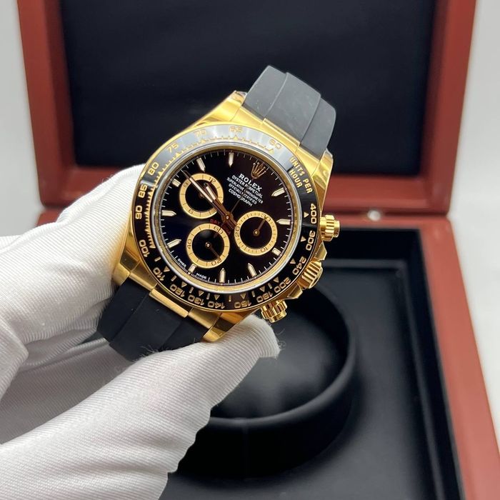Rolex daytona  gold